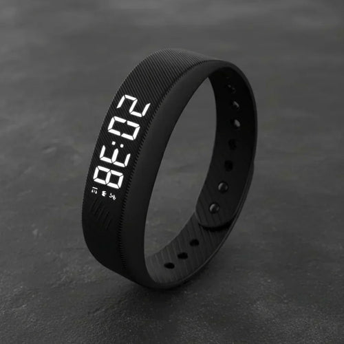 Bracelet connecté LED de test-high tech avec notifications, suivi d'activité et sommeil, porté au poignet.